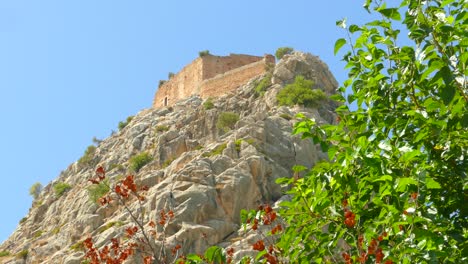 Vertical-traveling-to-log-castle-on-top-of-the-mountain-in-Borriol,-Spain