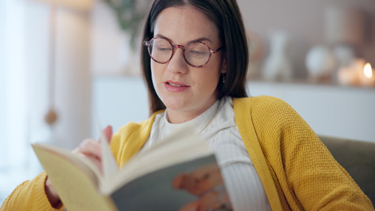 Woman reading a book indoors