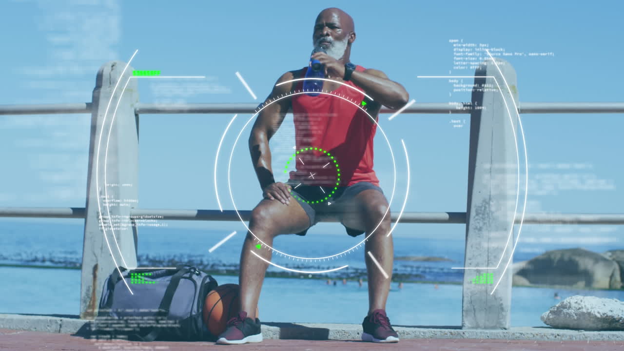 Animation of scope scanning over senior african american man drinking water at beach