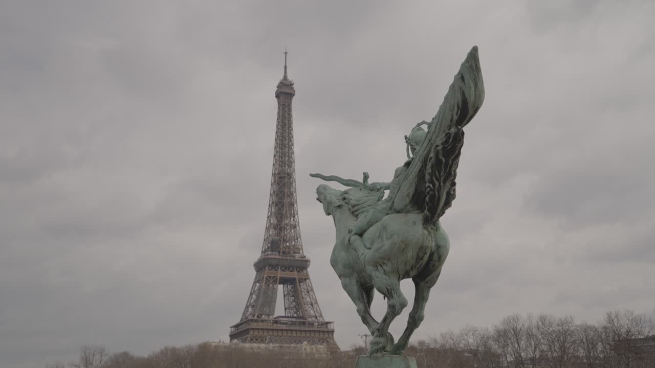 Eiffel Tower and Statue in Paris