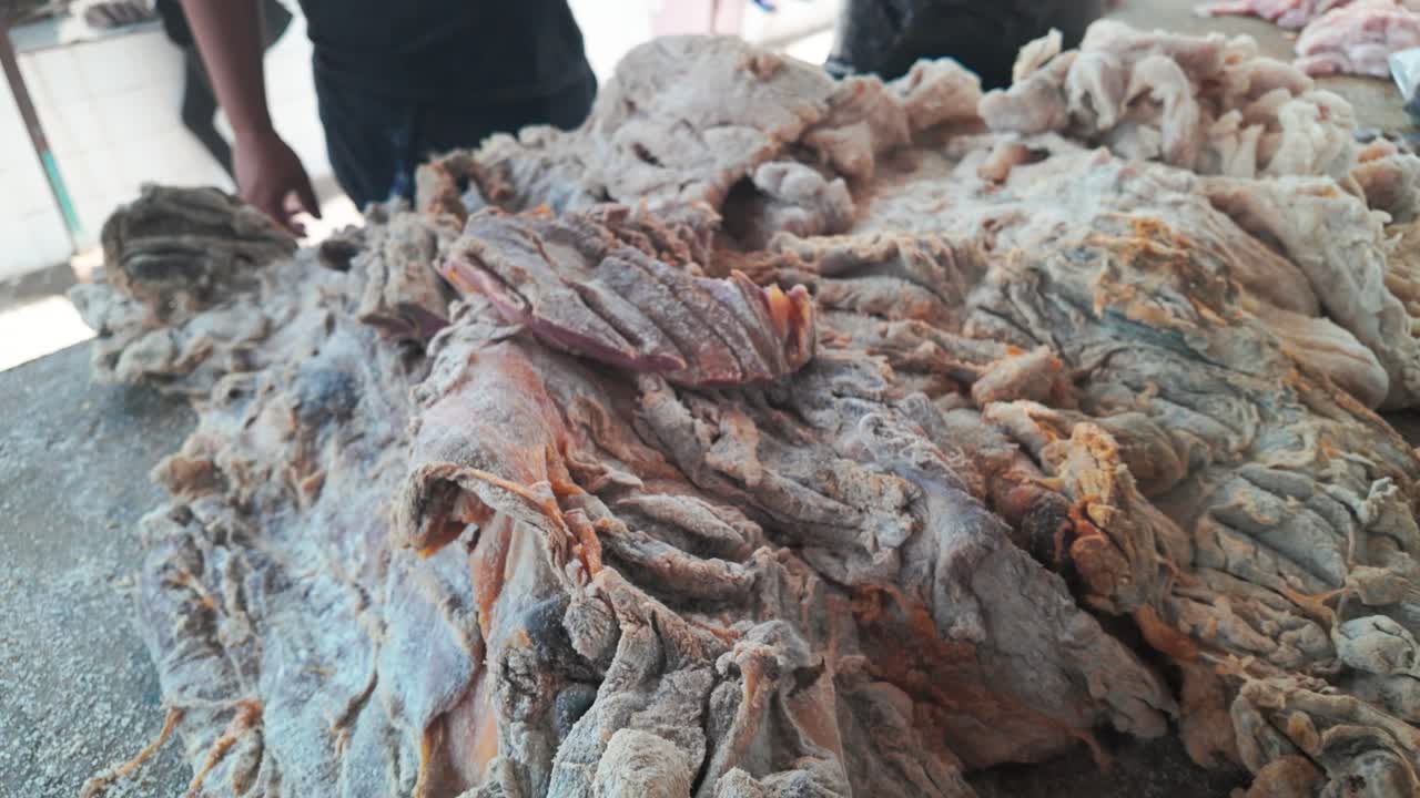 Salted capybara meat, a traditional Venezuelan delicacy, at a local market