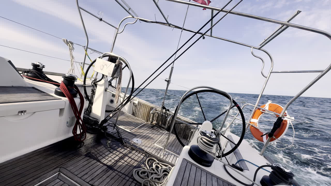 Mastering the North Sea Sailor's Perspective from the Helm of a Yacht, Navigating the Waves and Harnessing the Wind on a Journey of Freedom and Adventure