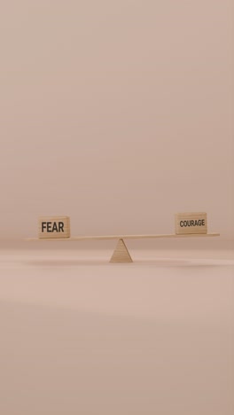 veritcal video of fear and courage balancing on seesaw