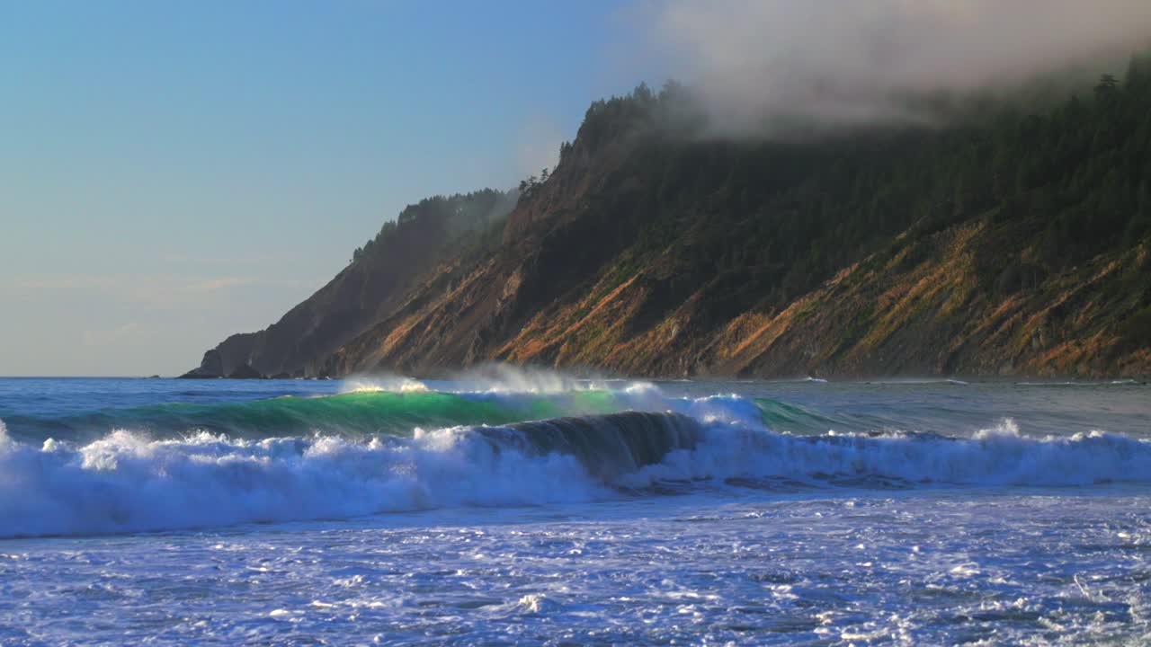 Pacific Ocean surf waves USAL Beach Campground sunset black sand waves Lost Coast Trail California sunny afternoon mist fog on bluffs rugged coastline remote untouched Sinkhole Wilderness static