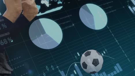 animation of data processing and football over caucasian male soccer player