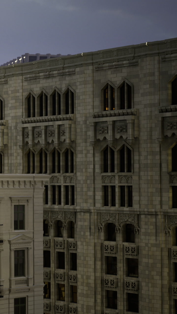 Sight of a historic building with intricate designs in an urban area at night