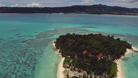 pull away drone shot of managaha island, northern mariana islands