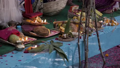 holy religious offerings with oil lamp and fruits for hindu sun god at chhath festival