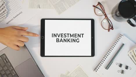 investment banking displaying on a tablet screen