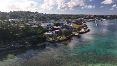 aerial view of a coastal town on a tropical island