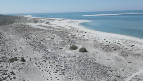 Fly-over-the-vast-expanse-of-beaches-and-sand-at-Pego-Beach,-Carvalhal