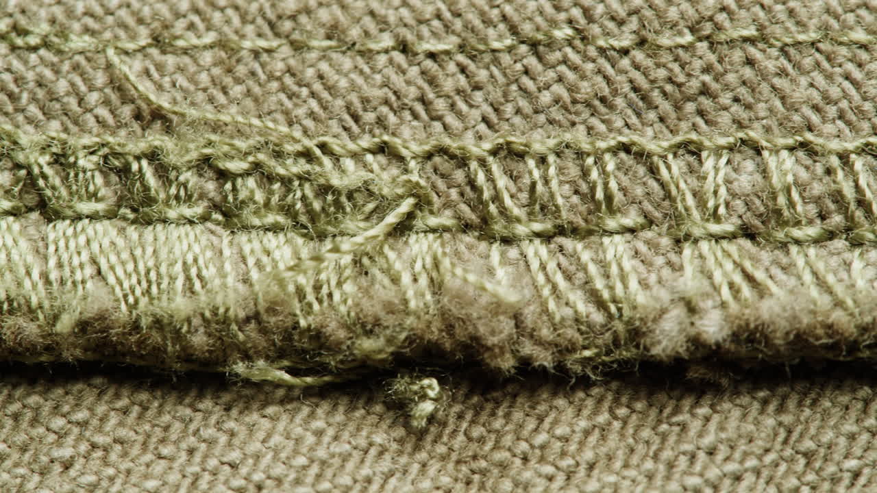 Close-up of a Frayed Denim Seam