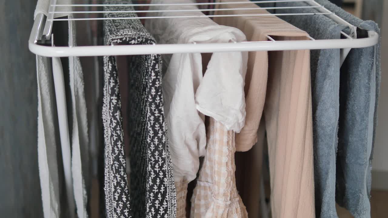 Clothes drying on a drying rack