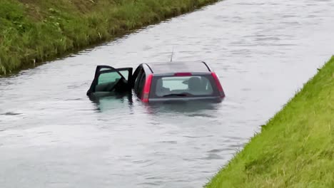 sinking car in the river