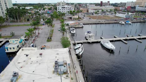 Drone-shot-of-a-damaged-boat-from-a-hurricane-in-Fort-Myers,-Florida