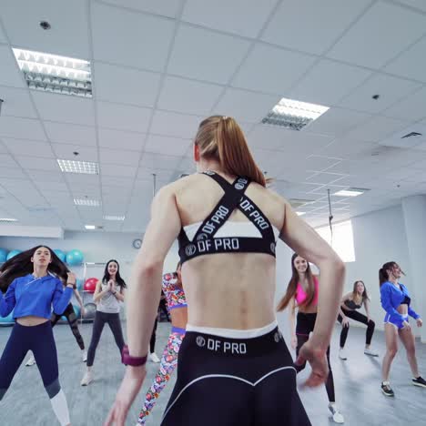 cheerful fitness team in gym