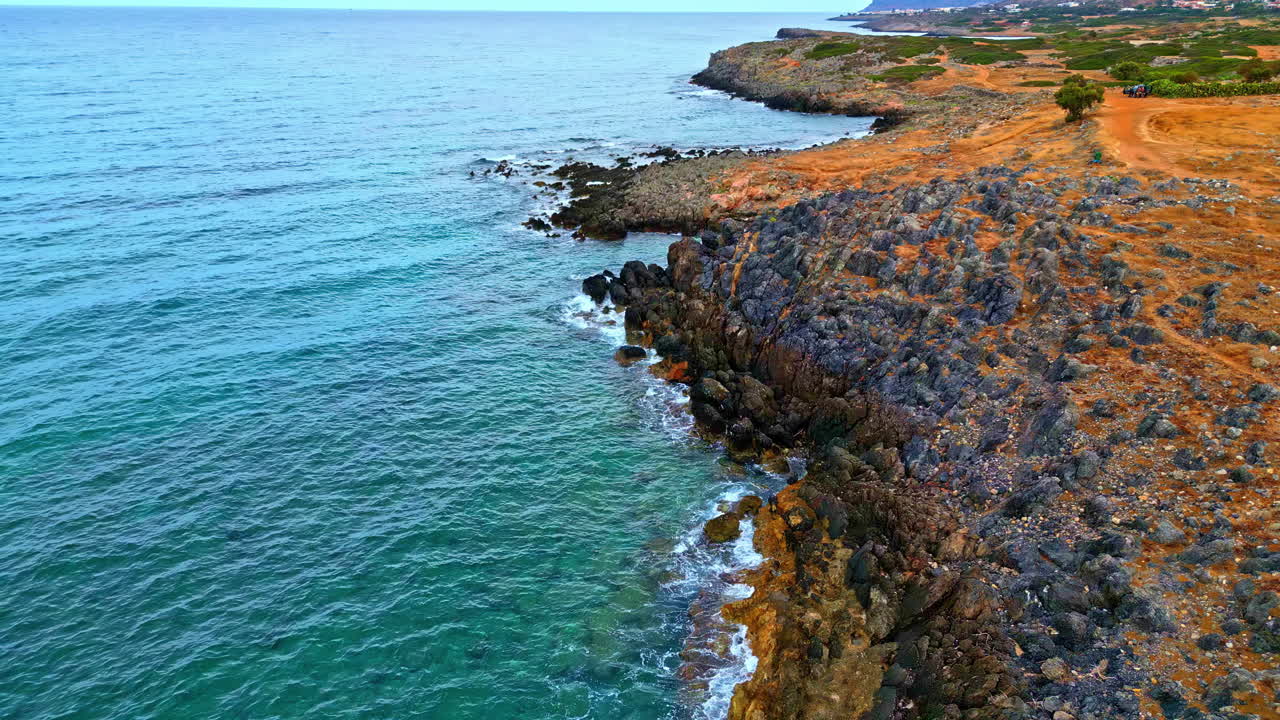 Aerial View of a Rocky Coastline with Turquoise Water