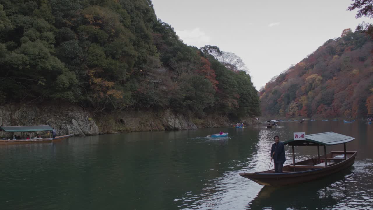 Autumn Scenery with Boats on a River