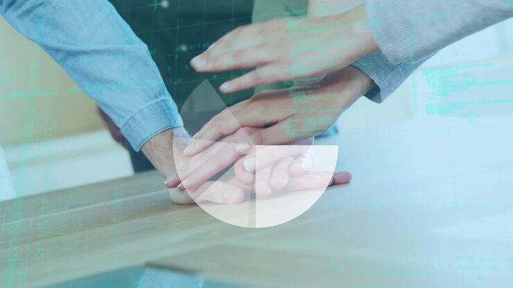 Animation of statistics and data processing over business colleagues stacking hands