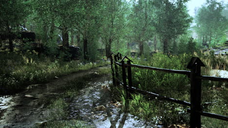 old-wooden-fence-and-dirt-road-in-the-countryside-at-summer-season