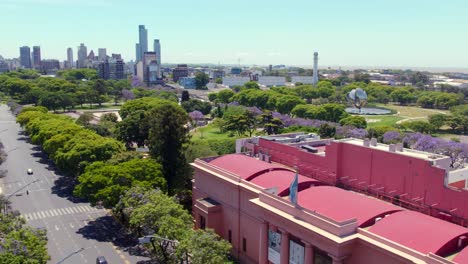 Aerial-view-of-the-Fine-Arts-Museum-of-Buenos-Aires-in-the-Recoleta-neighborhood,-low-traffic-and-residential-buildings-in-the-background-on-a-sunny-day