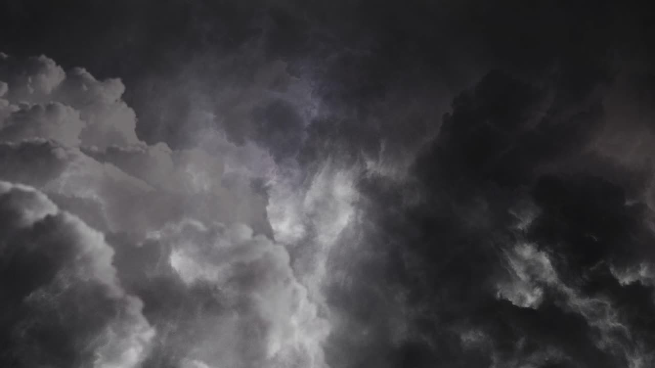 Lightning flashes in dark cumulonimbus clouds