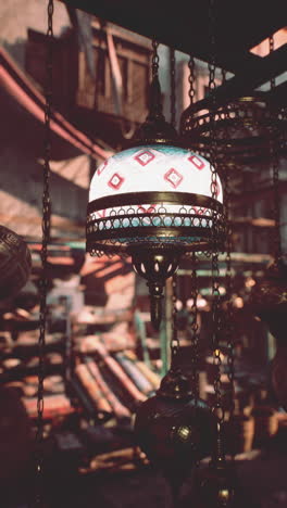 close up of a moroccan lamp hanging in a market