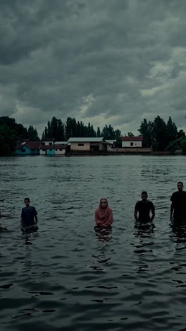 people in floodwaters