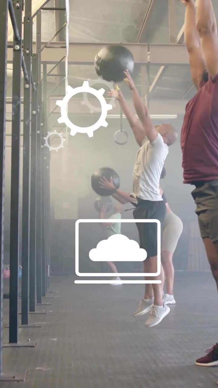 Animation of business icons over diverse people exercising with balls at gym