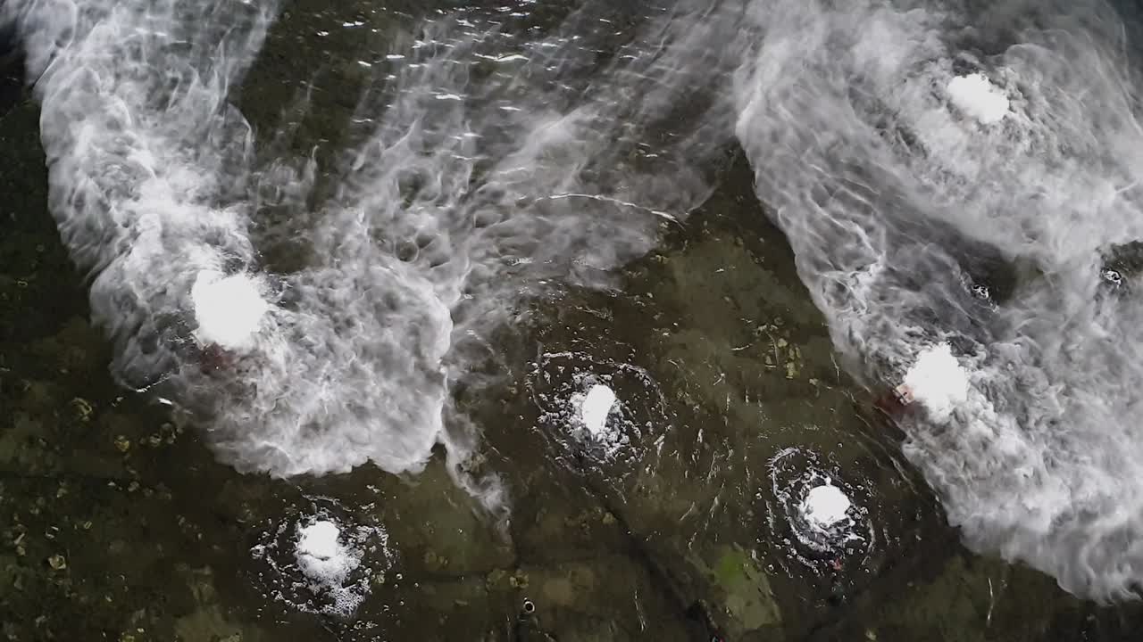Fog emitting generator over water pond beautiful slow motion movement over surface abstract concept