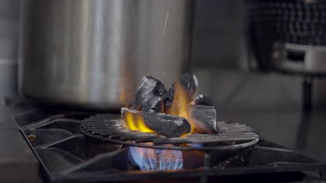 charcoal burning on a gas grill