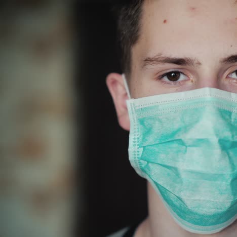 Portrait-Of-A-Young-Man-In-A-Protective-Mask