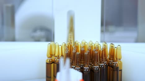 medicine packaging line. medicine bottles at automated production line