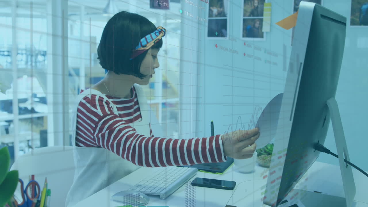 Animation of financial data processing over asian businesswoman in office