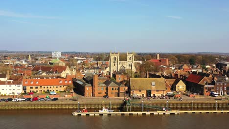 aerial view of kings lynn minster and riverfront, river great ouse, kings lynn, norfolk, uk