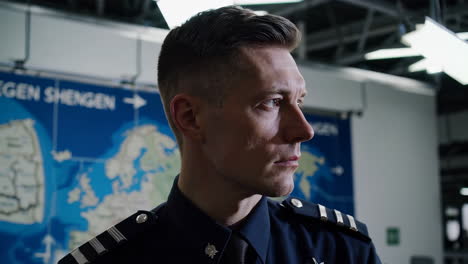 profile of a police officer at border control