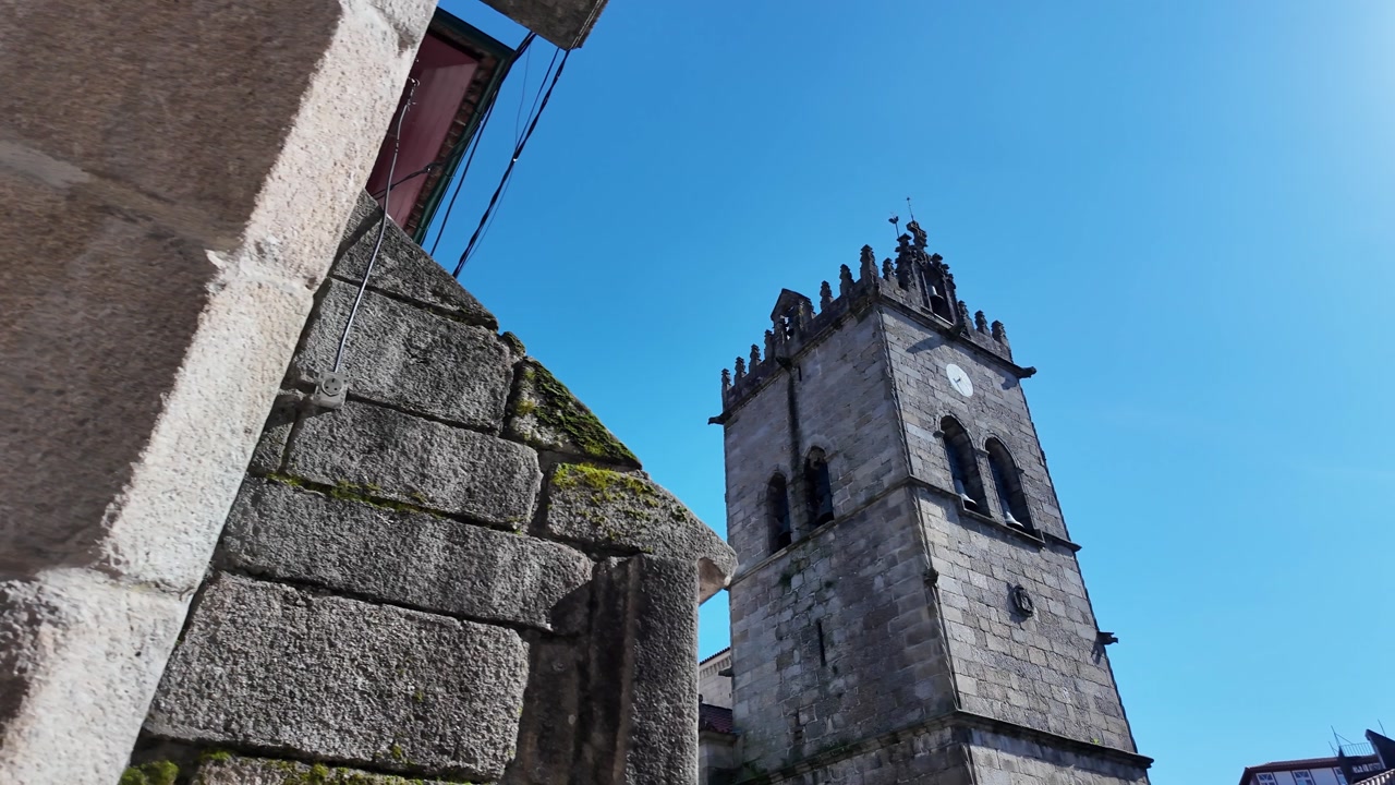 Guimaraes city monuments. Reveal of collegiate church of our lady of the olive tree.