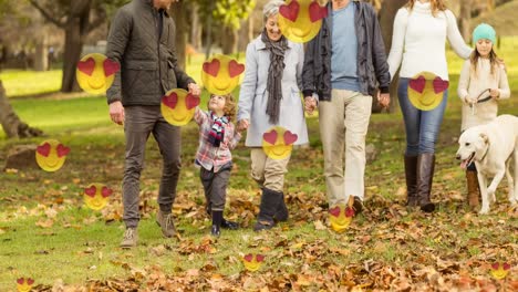 Los-Ojos-Del-Corazón-Se-Enfrentan-A-íconos-Emoji-Contra-Una-Familia-Caucásica-De-Tres-Generaciones-Con-Su-Perro-Mascota-En-El-Parque