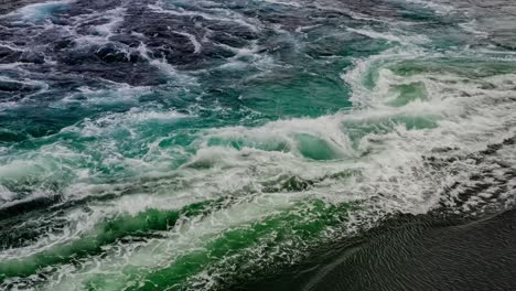 Waves-of-water-of-the-river-and-the-sea-meet-each-other-during-high-tide-and-low-tide.