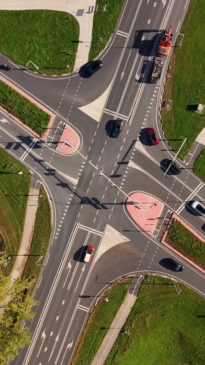 Aerial View of a Road Intersection with Cars