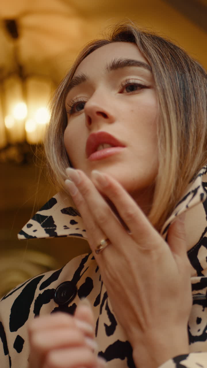 Woman in Leopard Print Trench Coat