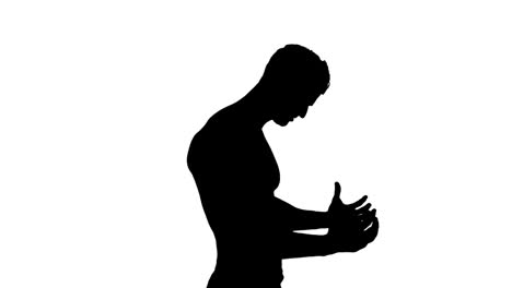 muscular silhouette of man flexing muscles