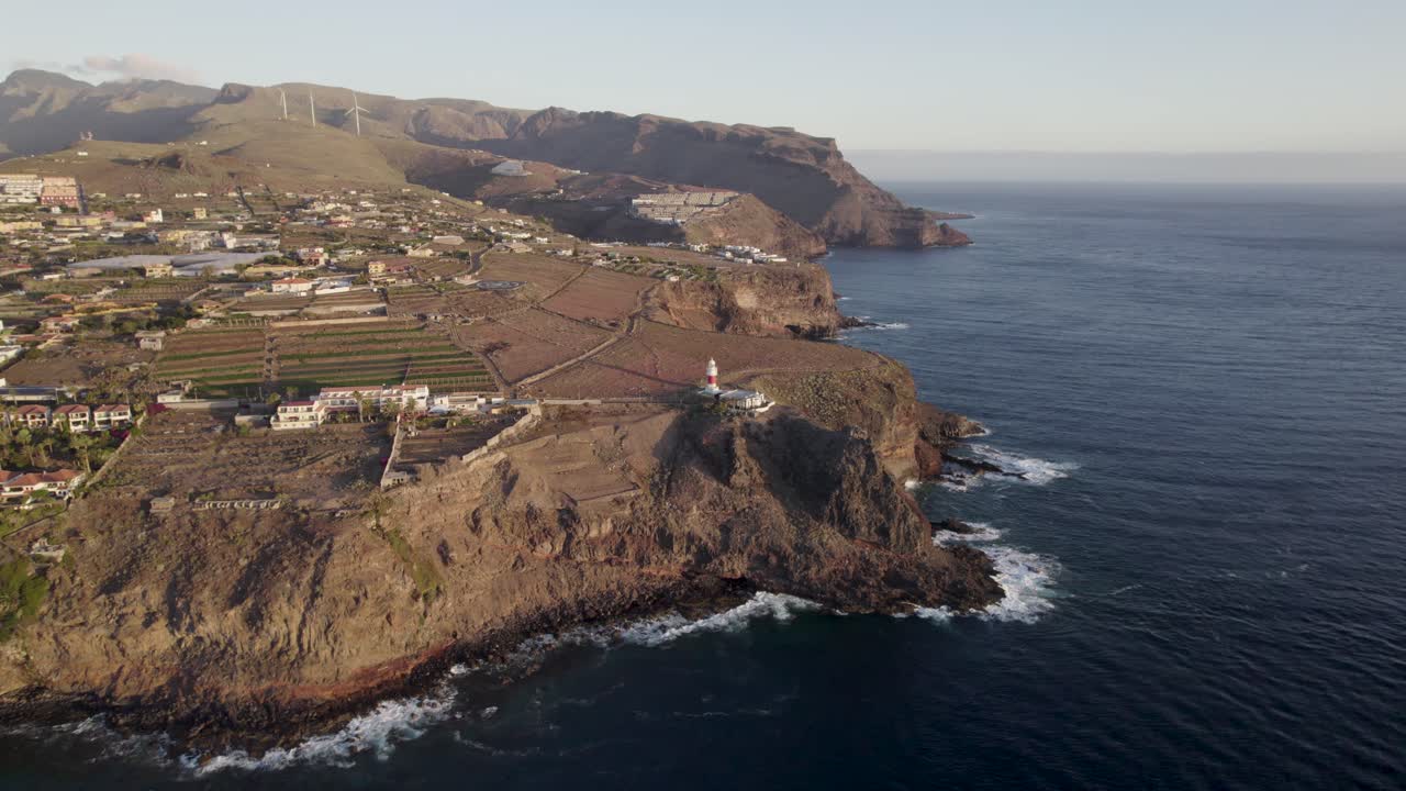 Birds eye view of La Gomera island and it's lighthouse. Drone shot