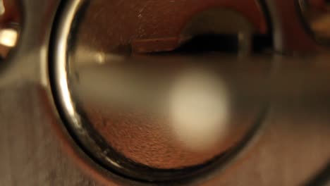 key inserted into deadbolt door lock and turned to the left and removed residentia extremel close up