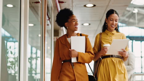 business women, talking and walking in office to