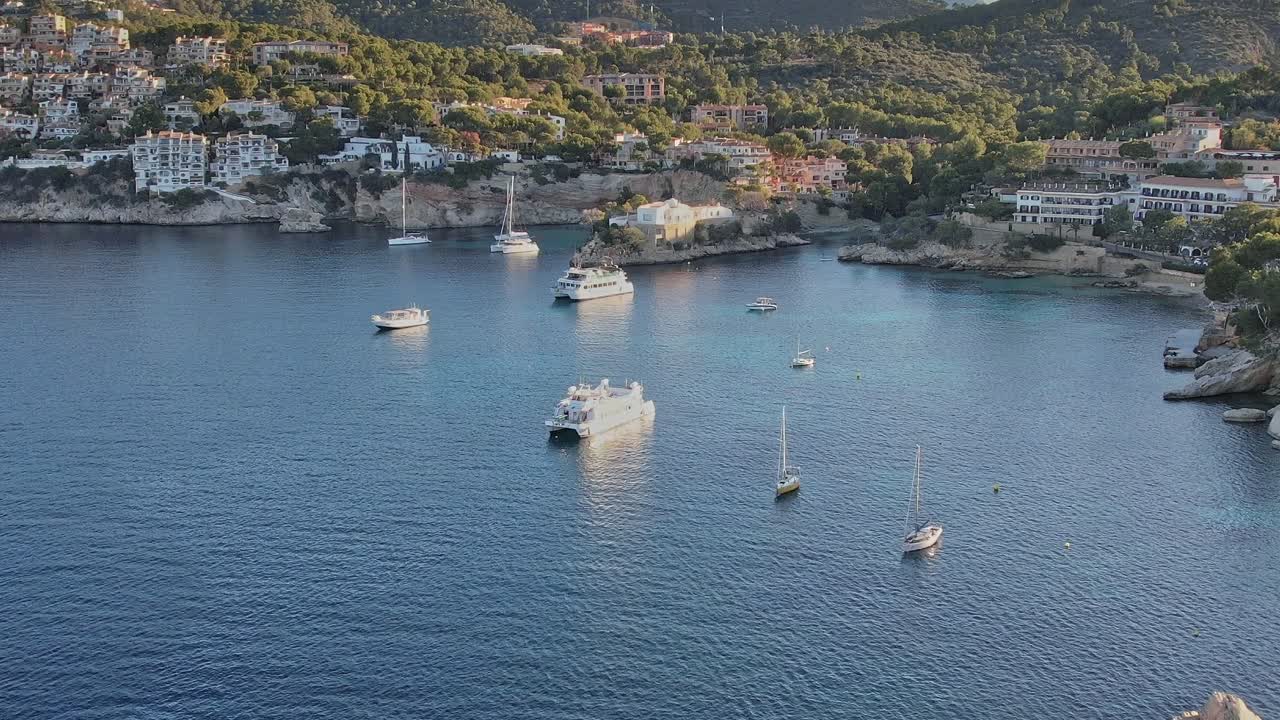 View of boats in the water near the coast of Mallorca, Spain