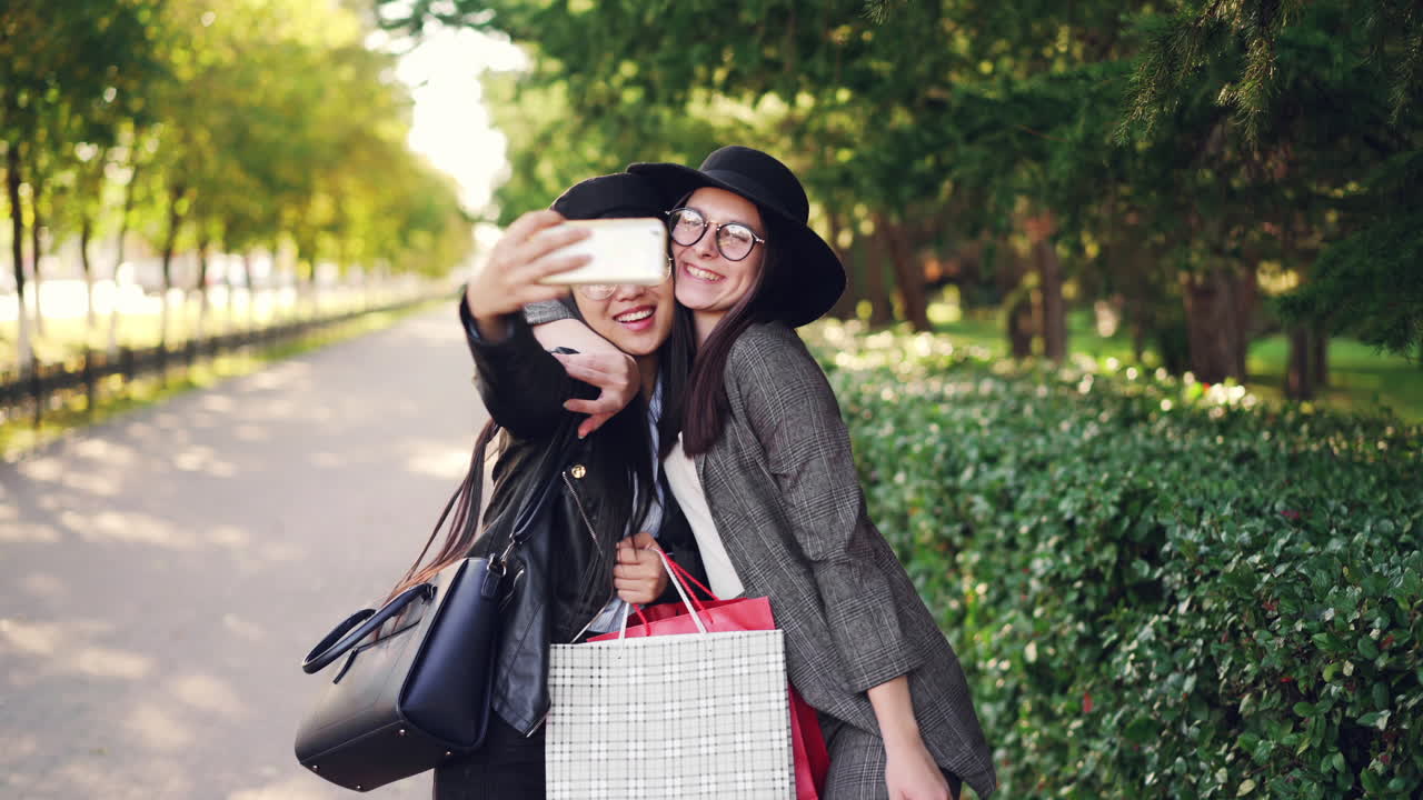 Two Women Taking a Selfie After Shopping