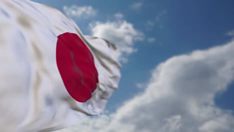 realistic japanese flag is waving slowly.