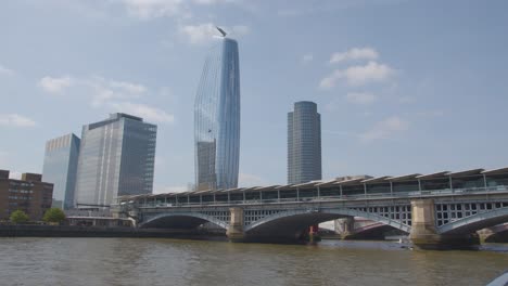 View-From-Boat-On-River-Thames-Going-Under-Blackfriars-Bridge-Showing-London-Skyline-3