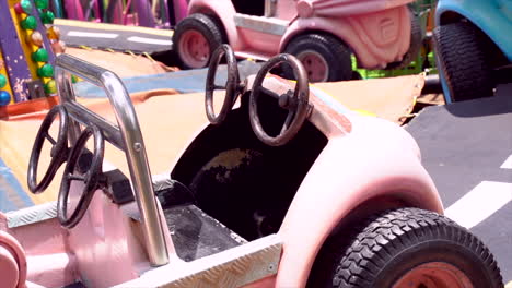 close-up of a ride-on car in an amusement park